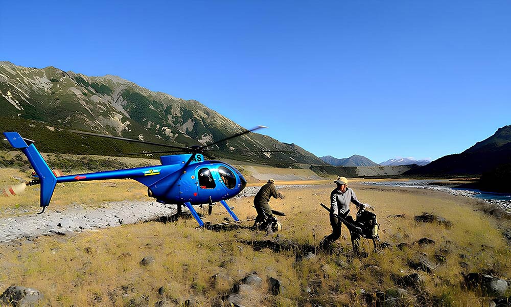 Heli fishing experiences, helicopter angling with fishermen at river