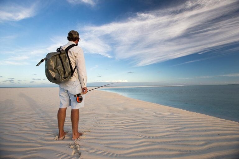 Walking along deserted beach Bahamas - Bair's Lodge