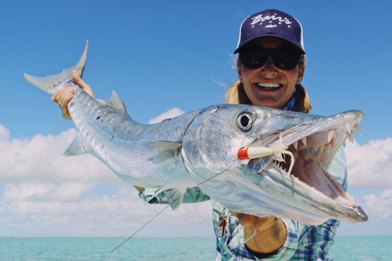 Woman with Barracuda, fly fishing