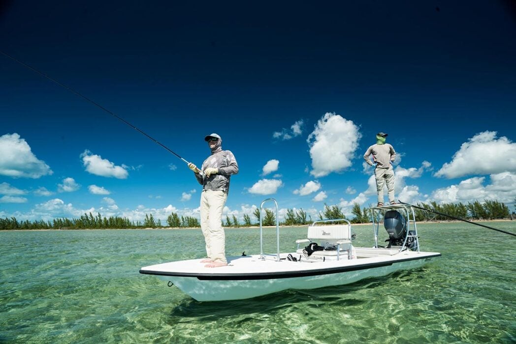 Angler bonefishing from Skiff boat