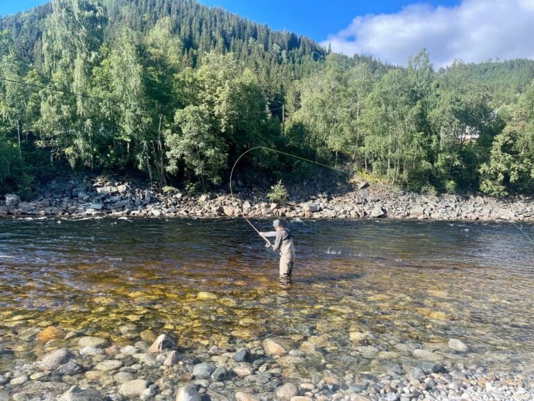 Angler spey casting Gaula river in Norway