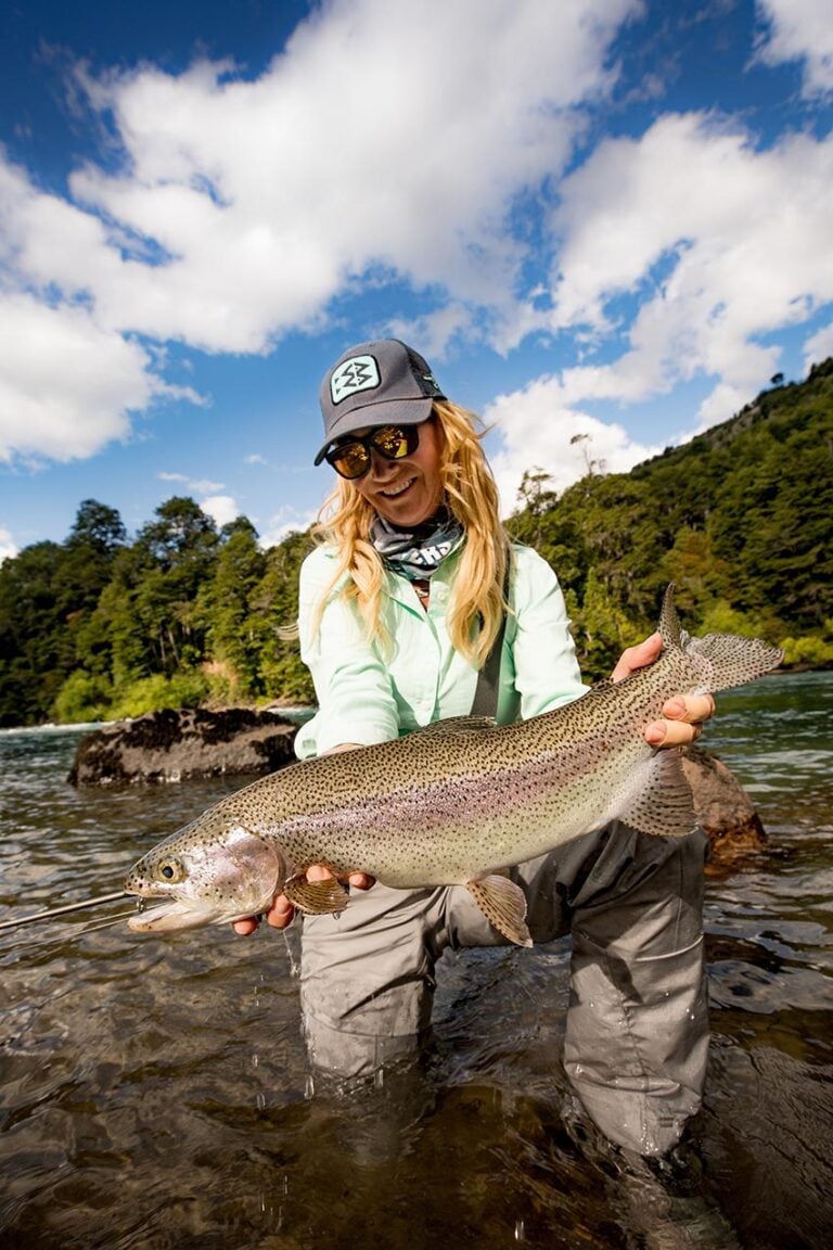 Big rainbow trout held by woman