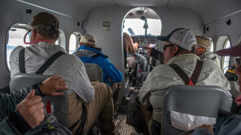 Anglers sitting in small aircraft