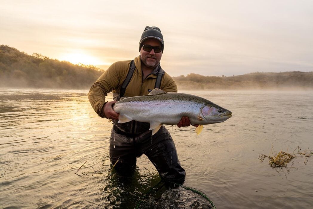 Rapids camp Alaska fly fishing - large rainbow