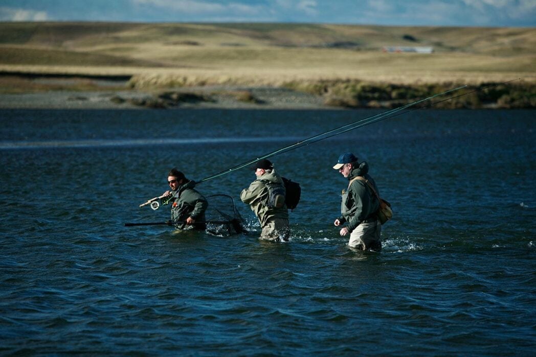 Guided fishing in Argentina, wading across water