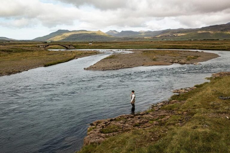 Fisherman in Iceland fishing river