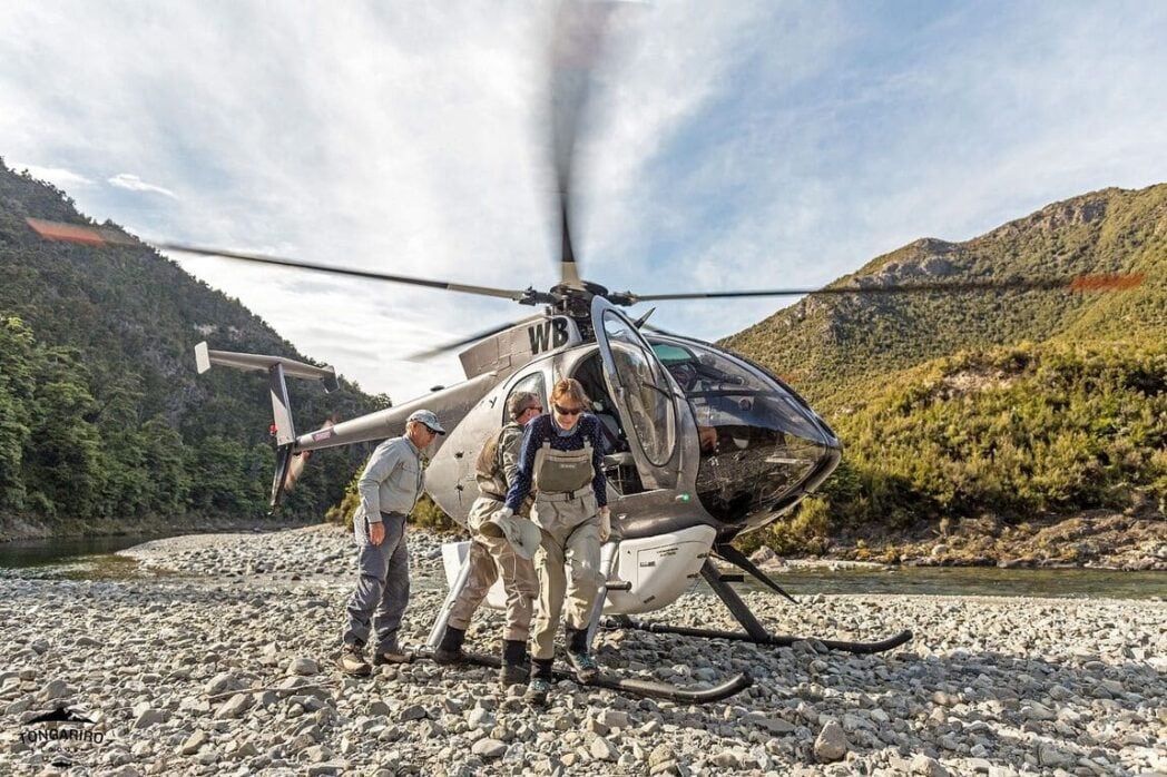 Heli angling, Tongariro Lodge - anglers leaving helicopter