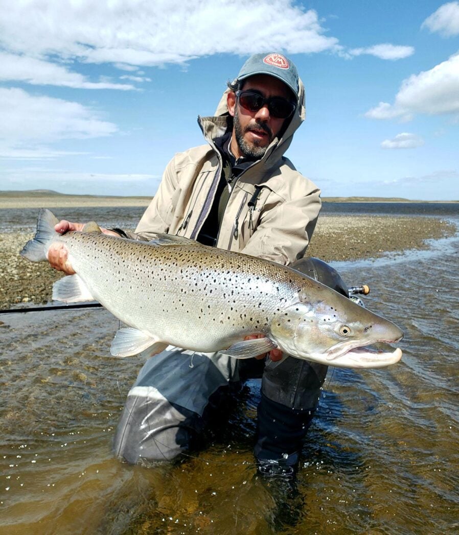 Angler at Villa Maria holding fish