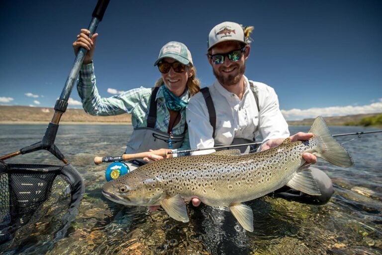 Angler with trophy trout, Patagonia waters