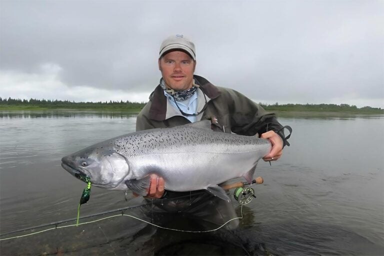 King salmon held by angler, Alaska Bristol Bay