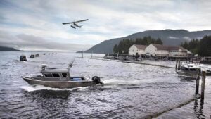 Boat fleet leaving Waterfall Resort for the salmon fishing grounds