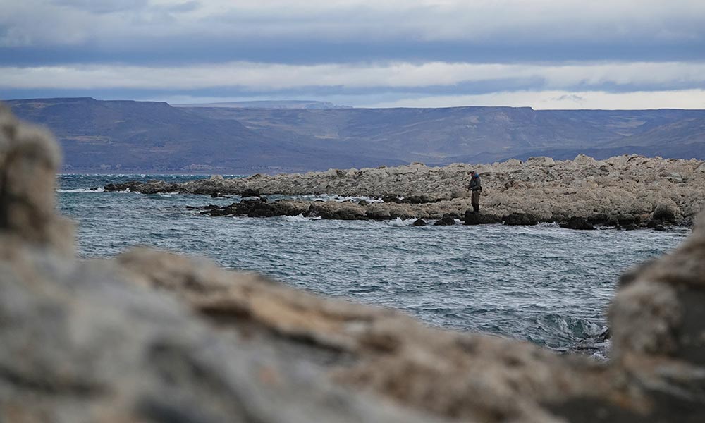 Angler fishing Jurassic Lake in Santa Cruz Patagonia